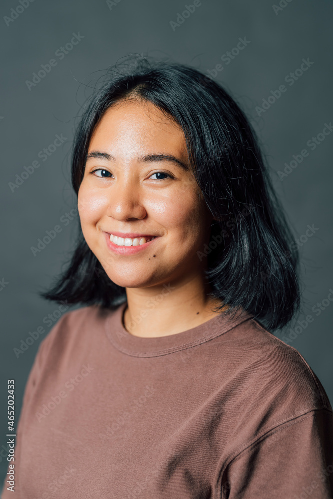 Smiling young woman in studio Smiling young woman in studio