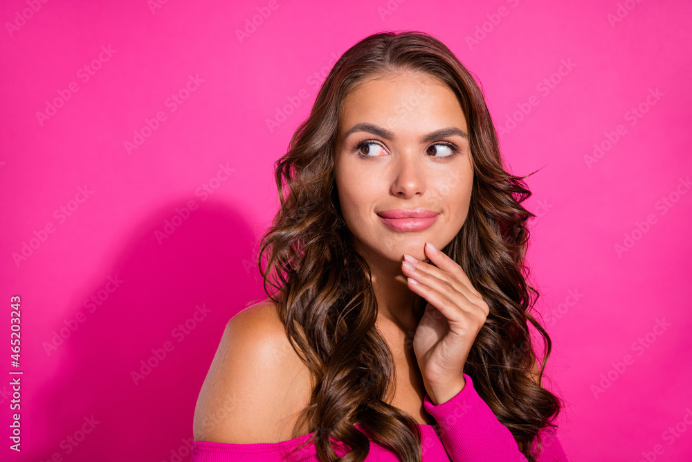 Portrait of attractive minded wavy-haired girl touching chin thinking copy space isolated over bright pink color background Portrait of attractive minded wavy-haired girl touching chin thinking copy space isolated over bright pink color background