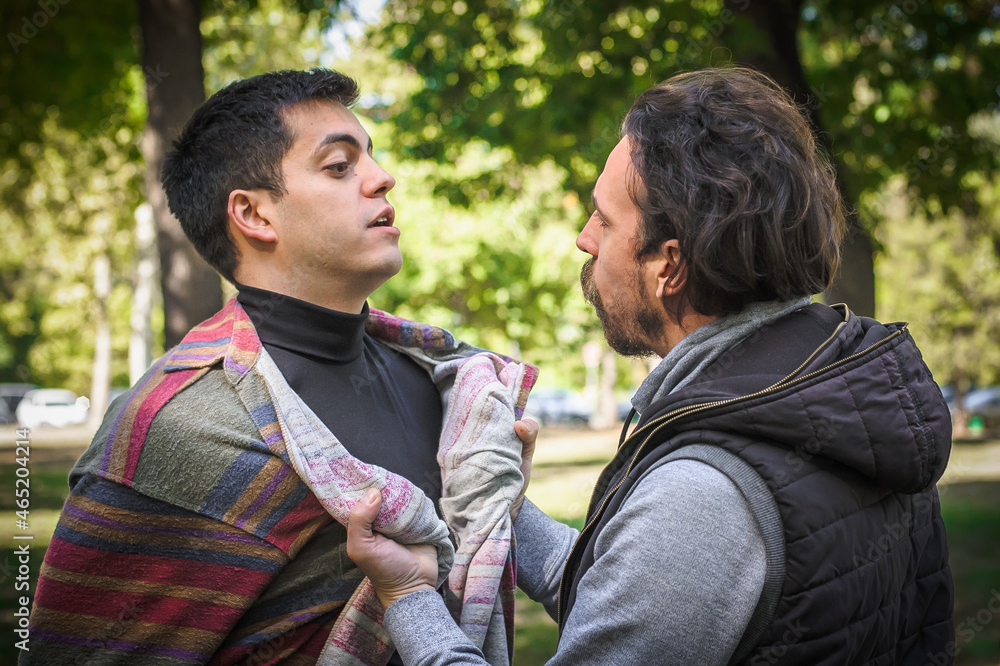 Obraz premium Angry, nervous and upset men in an aggressive quarrel conflict