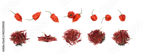 Fotografie Heap of Dry Red Chili Peppers, Black and Pink Pepper Isolated
