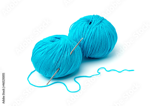 Blue ball of yarn on white background