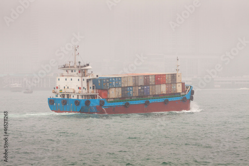 Container Ship on Victoria Harbour in Fog