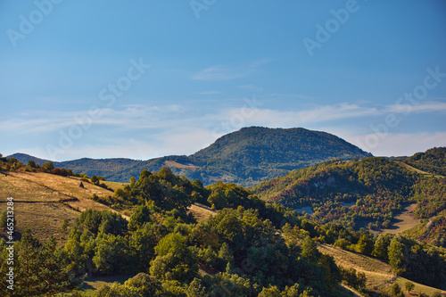 View of countryside hilly landscape in autumn colors.