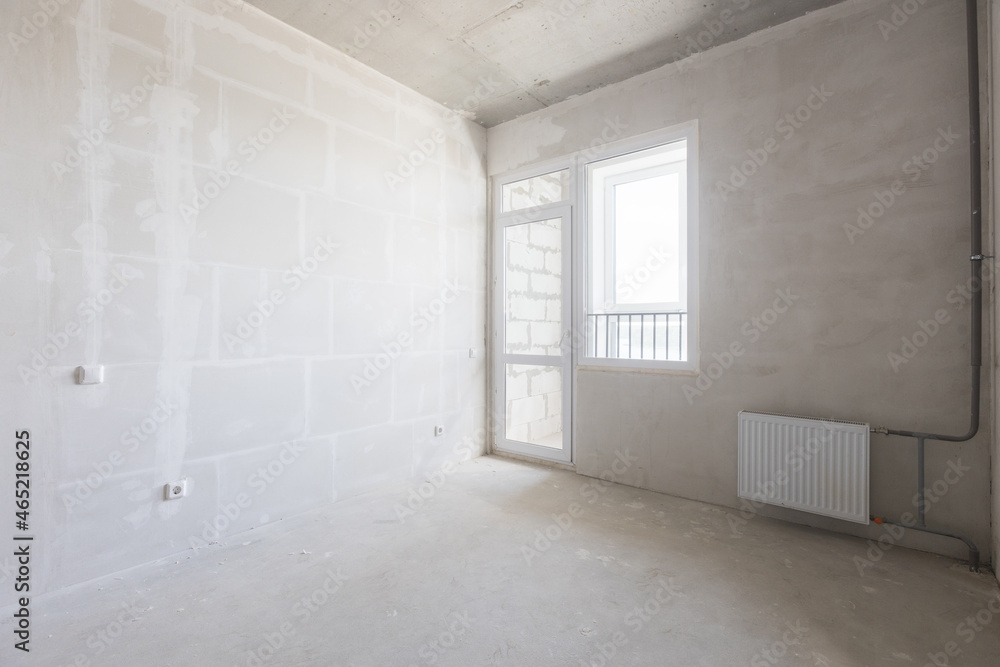 interior of the apartment without decoration in gray colors interior of the apartment without decoration in gray colors