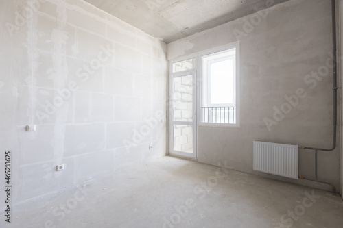 interior of the apartment without decoration in gray colors © gluschenkoart