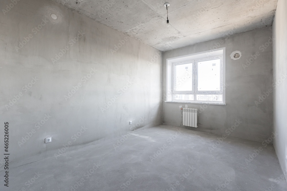 Obraz premium interior of the apartment without decoration in gray colors