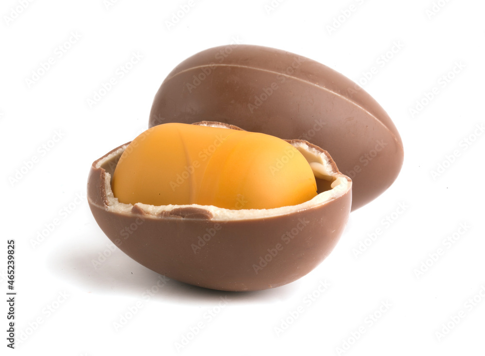 chocolate egg with surprise on white background chocolate egg with surprise on white background