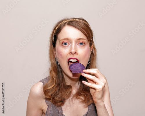 Woman eating chips