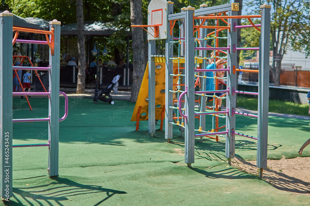  colorful childrens playground in a modern public green park 