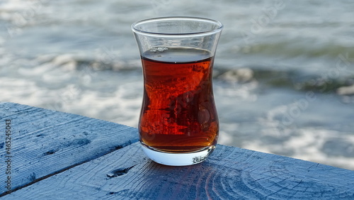 a glass of brewed rize tea photo