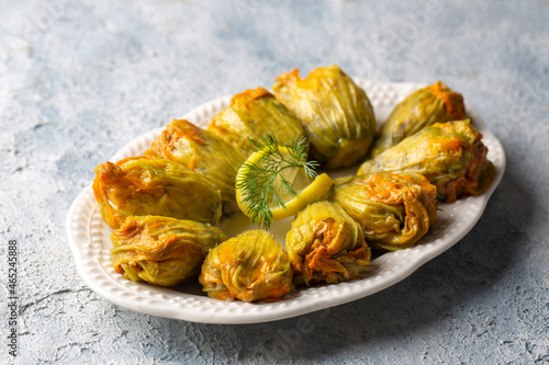 Traditional delicious Turkish - Greek cuisine, Turkish food; Stuffed zucchini flowers (Turkish name; kabak cicegi dolmasi) photo