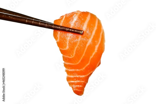 Salmon sushi in chopsticks isolated on white background