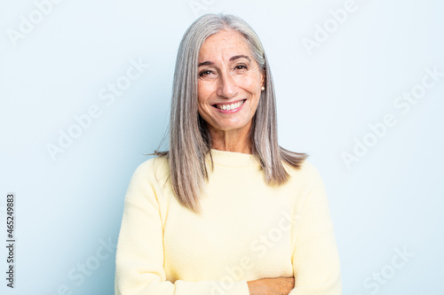 Bild auf Leinwand middle age gray hair woman looking like a happy, proud and satisfied achiever sm