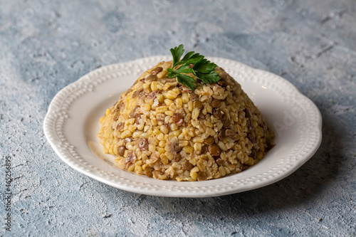 Traditional delicious Turkish foods; bulgur pilaf with green lentils (Turkish name; yesil mercimekli bulgur pilavi) photo