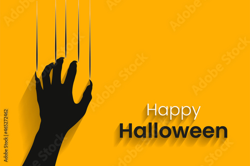 Halloween concept with scratching marks on yellow wall, yellow background copy space