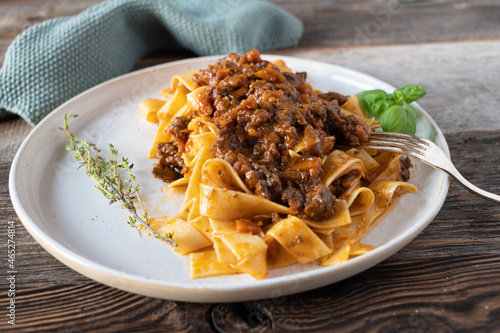 Duck ragout alla bolognese with pasta on a plate