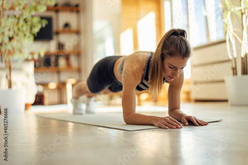 Adult woman, doing a morning workout.