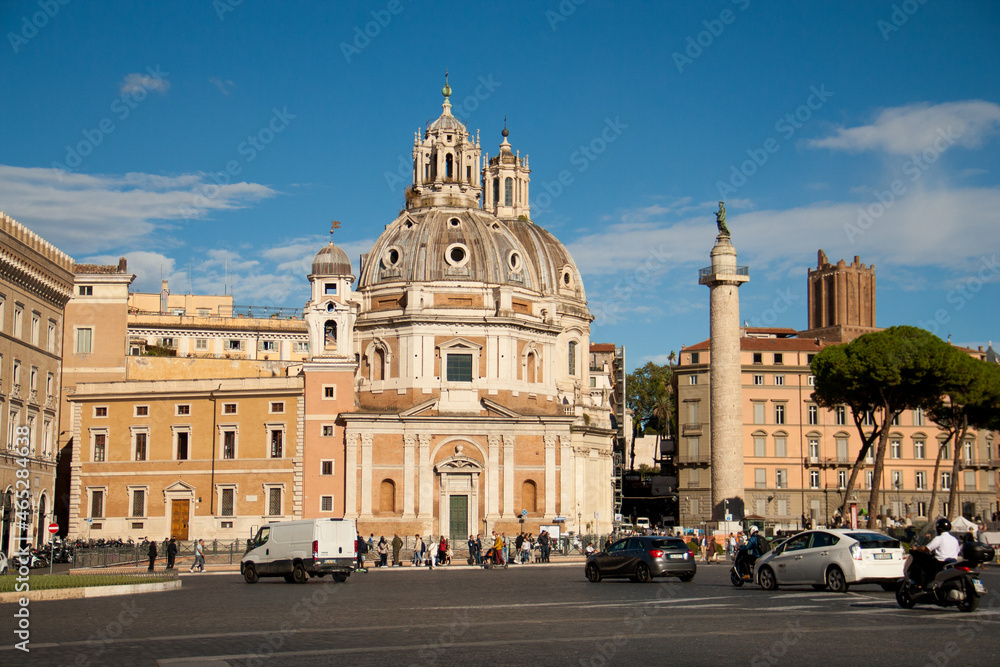 View on column of Traijan, church Santa Maria de Loreto and pine trees from the squre of Venice in Rome