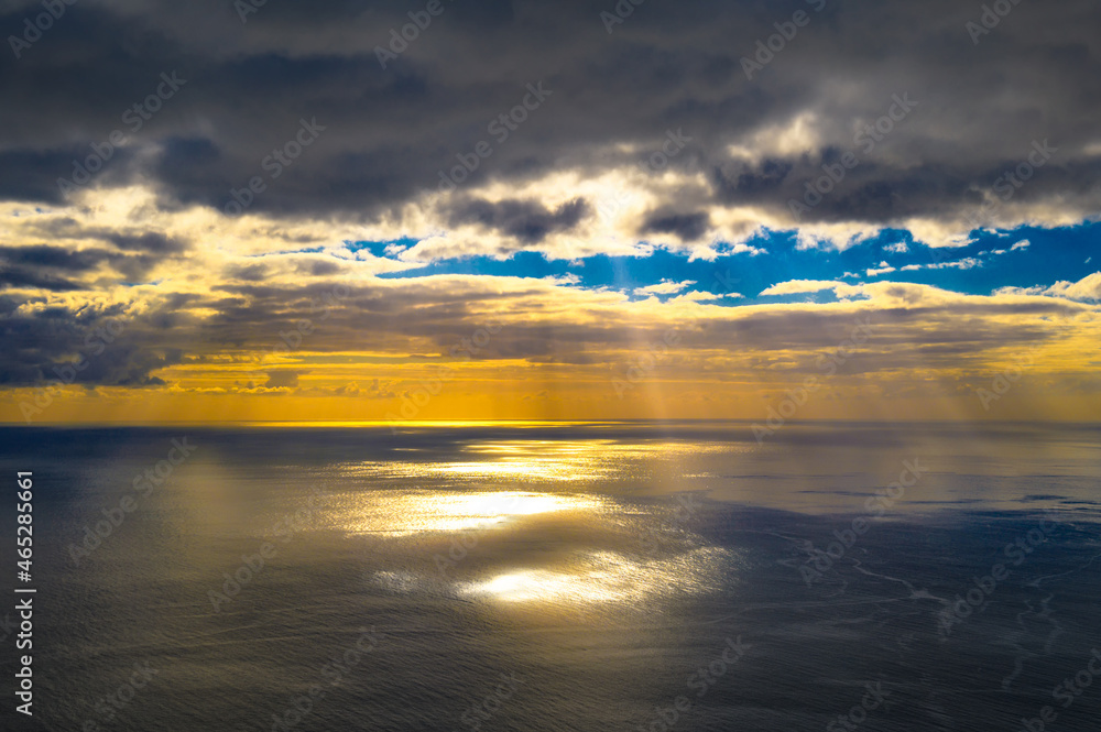 Aerial view of sunset over Atlantic Ocean seen from Madeira, Portugal
