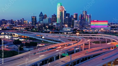 Aerial Hyperlapse of freeway traffic at sunset and downtown Dallas, Texas, USA photo