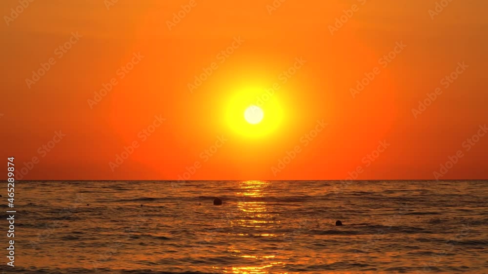Dramatic sea sunrise. Burning sky and shining golden waves. Dramatic sea sunrise. Burning sky and shining golden waves.