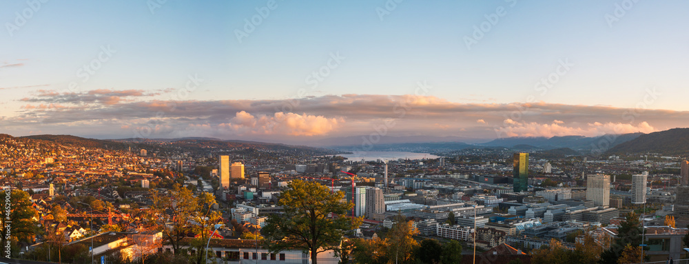 High angle panoramic vista view of Zurich city Switzerland. Autumn, late evening, after sunset, high resolution