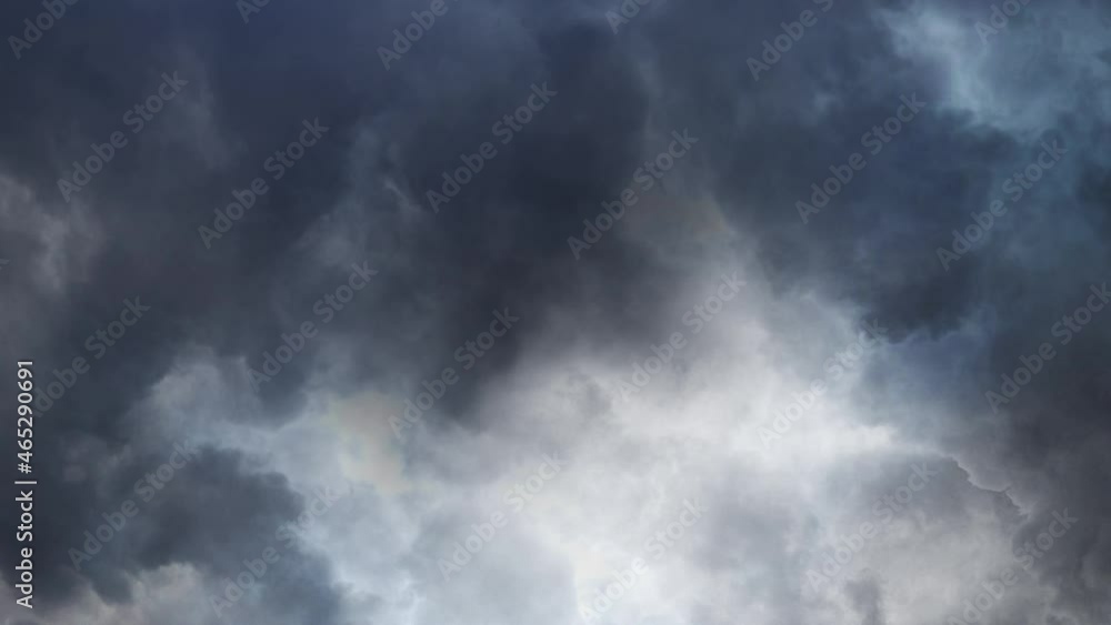 gray clouds with thunderstorms in the sky gray clouds with thunderstorms in the sky