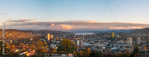 High angle panoramic vista view of Zurich city Switzerland. Autumn, late evening, after sunset, high resolution