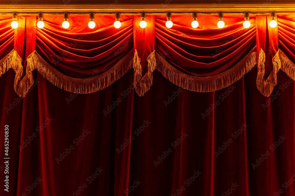 Theater red curtain and neon lamp around border.