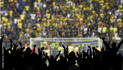 Quadro em tela Blurry soccer match with public celebration