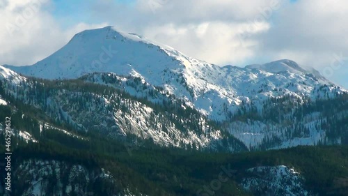 Pan view on snowy mountains. Scenic Winter landscapes. photo