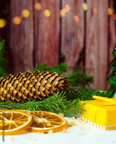 Festive wooden background with glittering bokeh lights, illuminated by a spotlight, ideal for Christmas or other occasions