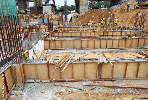 Photography KUALA LUMPUR, MALAYSIA -MARCH 29, 2021: Building ground beam under construction at the site using timber plywood as the formwork