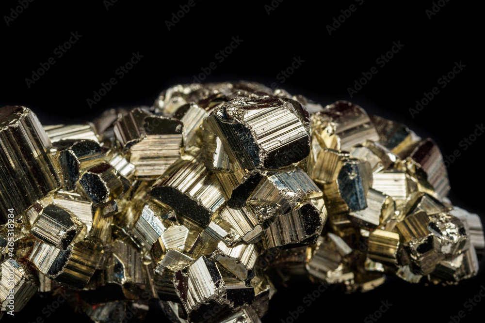Macro mineral stone Pyrite on a black background Macro mineral stone Pyrite on a black background