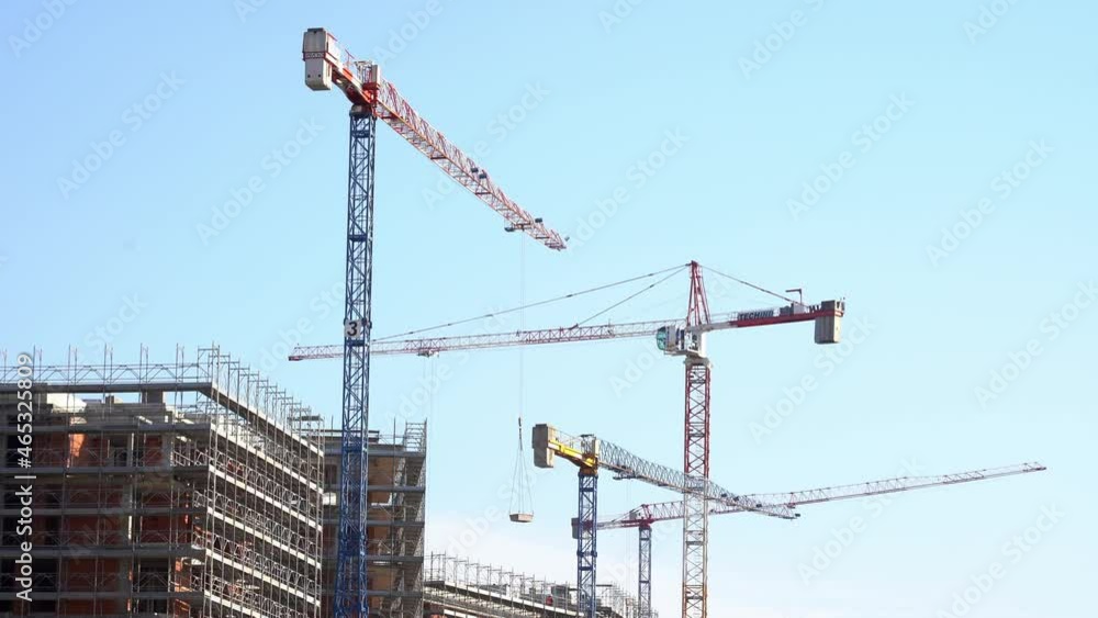 DOLOMITI Europe, Italy , Milan October 2021 crane for the construction of a housing center - construction site and economic recovery after the Covid-19 Coronavirus pandemic - 110% state bonu- TRENTINO DOLOMITI Europe, Italy , Milan October 2021 crane for the construction of a housing center - construction site and economic recovery after the Covid-19 Coronavirus pandemic - 110% state bonu- TRENTINO
