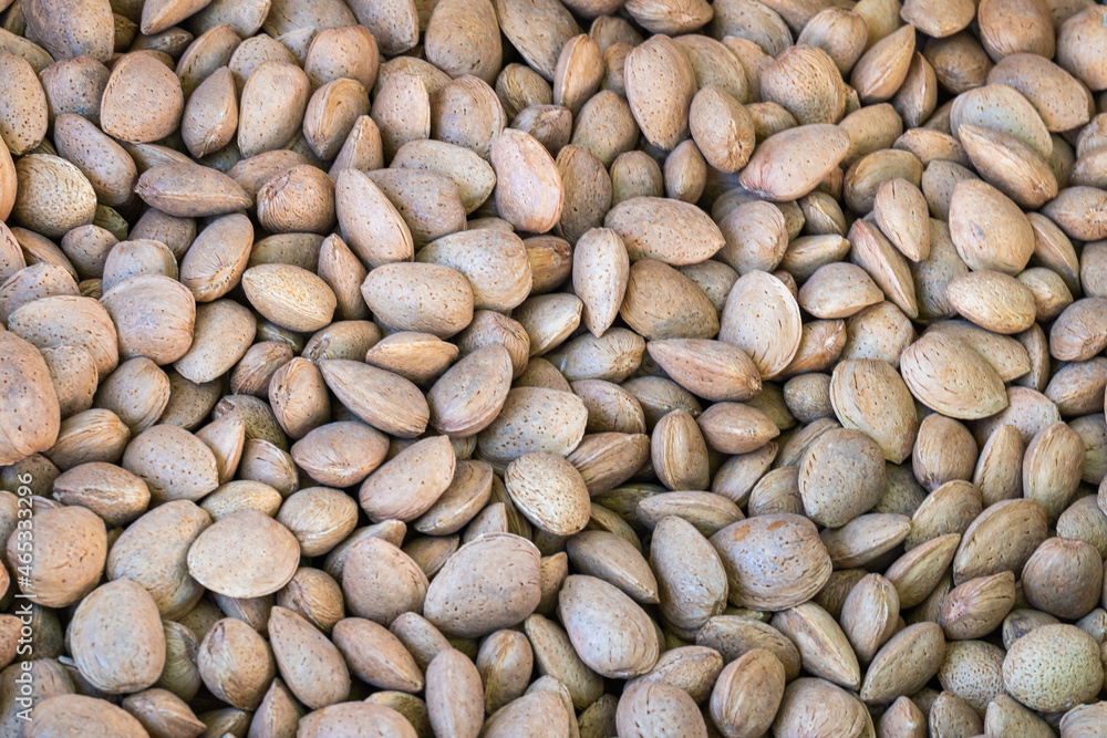 Heap of almonds grown locally and sold in bulk in a market Heap of almonds grown locally and sold in bulk in a market