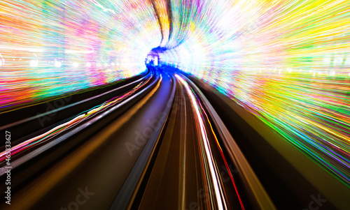 Abstract train moving in tunnel.