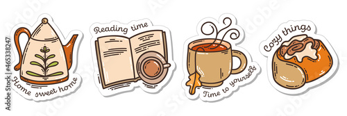 Colorful hand-drawn autumn hygge stickers set with teapot, a cup of tea, book, and a cinnamon bun in doodle style isolated on white background. Cute vector collection for seasonal decoration.