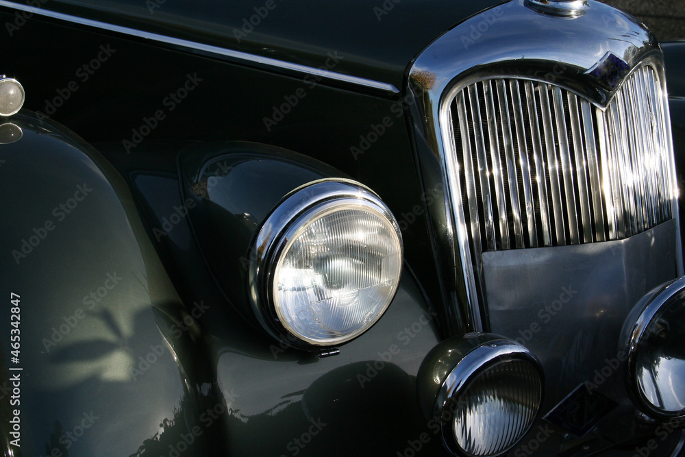 Beautiful close up of old and vintage shiny classic car
