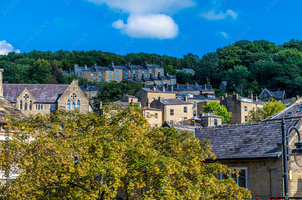 A view of houses built on the valley sides in Hebden Bridge, Yorkshire, UK in summertime A view of houses built on the valley sides in Hebden Bridge, Yorkshire, UK in summertime