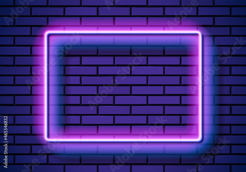 Neon frame with square shape on the blue brick wall. Classic rectangular 80s styled purple shiny glowing neon sign.