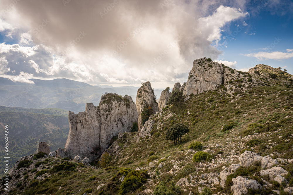 Landscape with steep mountains on a day with sun and clouds, in Serrella mountain, Alicante (Spain)