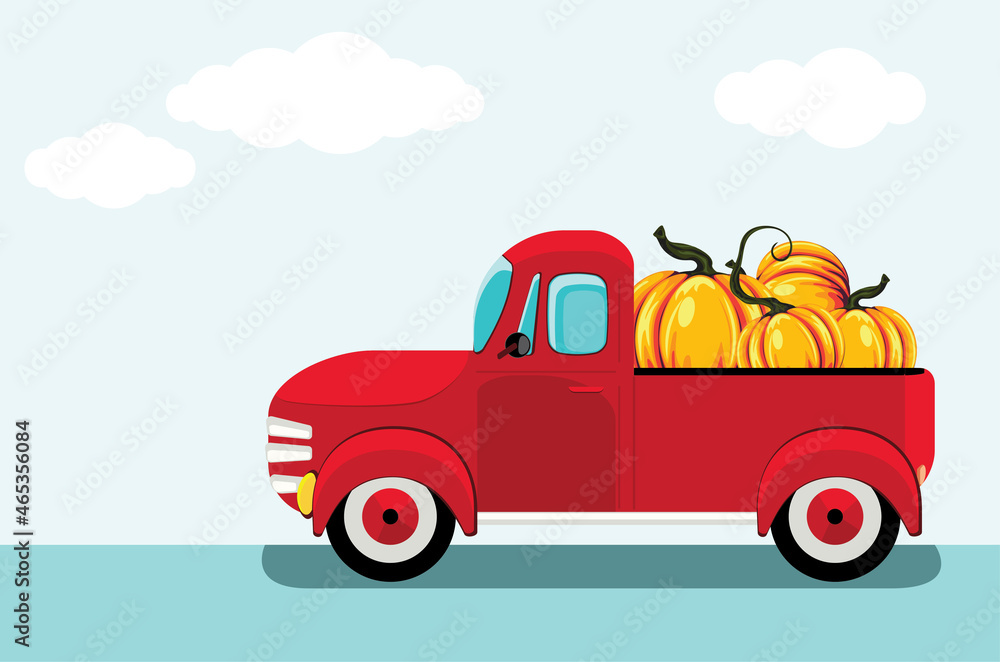 Red pickup truck and pumpkins