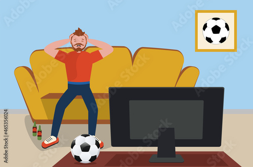 Man watch soccer on TV