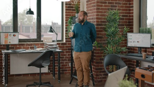 Woman flirting with man and having sexual desire in office. Business employee taking break at water cooler while colleague doing inappropriate touch. Worker with harassment behaviour. photo