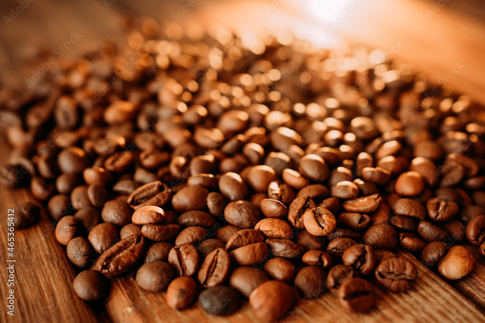 roasted coffee beans with beautiful backlight. use as background. fragrant and useful background. macro photo of coffee beans roasted coffee beans with beautiful backlight. use as background. fragrant and useful background. macro photo of coffee beans