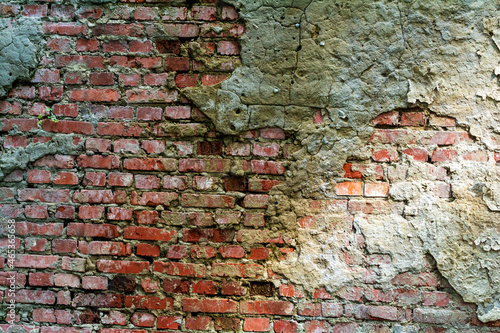 Old red brick wall. Background and texture