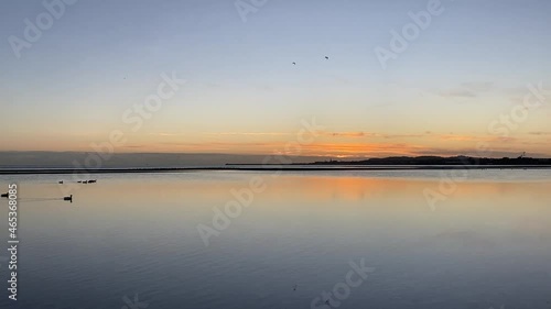 Reflective dawn over Dublin Bay, Ireland