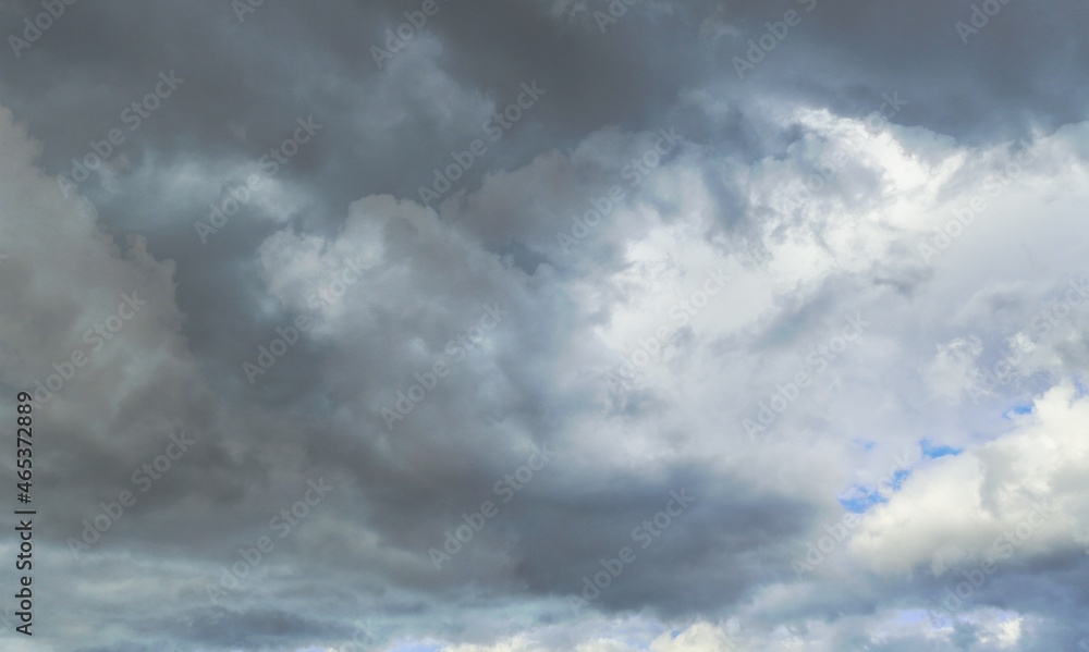 Dark storm clouds in the sky before the rain. Dark gray dust clouds Dark storm clouds in the sky before the rain. Dark gray dust clouds