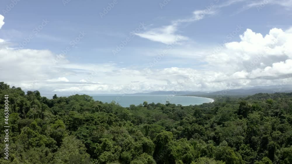 Osa Peninsula, Drone shot over the jungle with the beach in the background Osa Peninsula, Drone shot over the jungle with the beach in the background